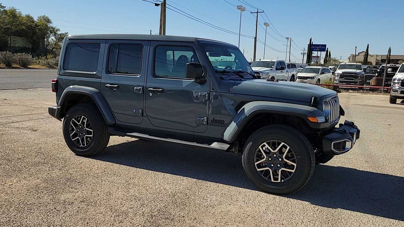 2026 Jeep Wrangler — rear three-quarter view
