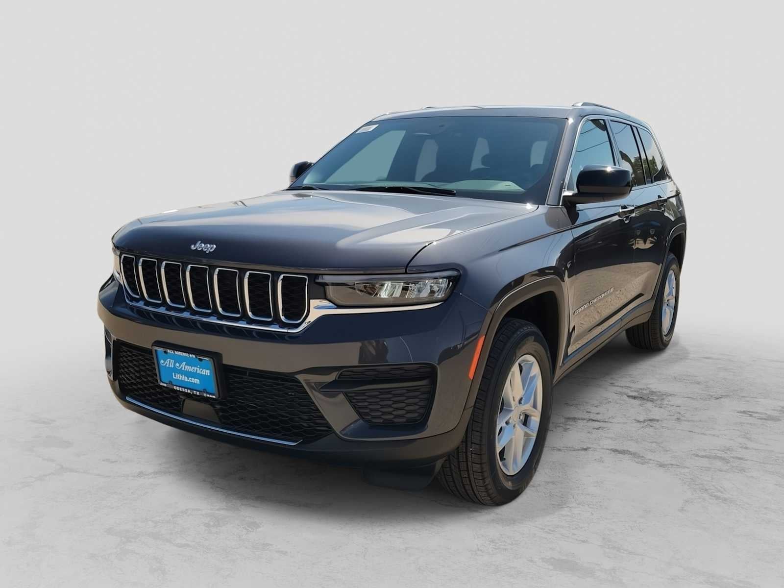 2026 Jeep Grand Cherokee GRAND CHEROKEE LAREDO X 4X4 in Baltic Gray Metallic Clear-Coat Exterior Paint — front three-quarter view
