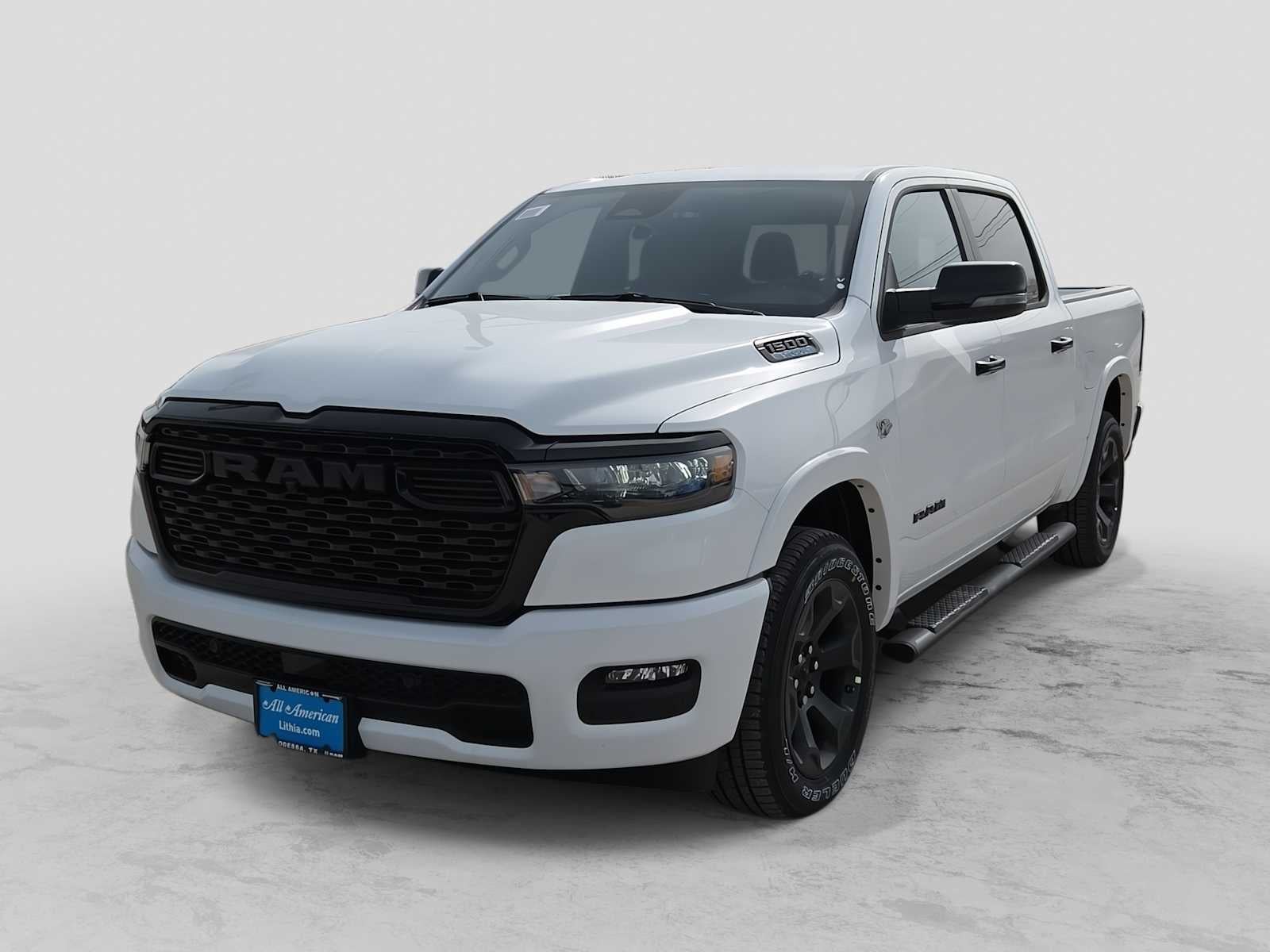 2026 RAM 1500 RAM 1500 BIG HORN CREW CAB 4X4 5'7' BOX in Bright White Clear-Coat Exterior Paint — front three-quarter view