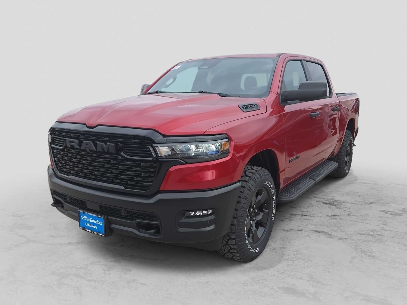 2026 RAM 1500 RAM 1500 WARLOCK CREW CAB 4X4 5'7' BOX in Molten Red Pearl-Coat Exterior Paint — front three-quarter view
