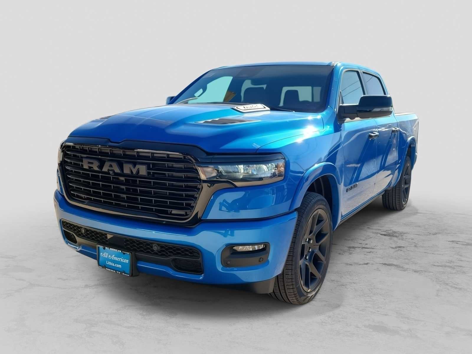 2026 RAM 1500 RAM 1500 LARAMIE CREW CAB 4X4 5'7' BOX in Hydro Blue Pearl-Coat Exterior Paint — front three-quarter view