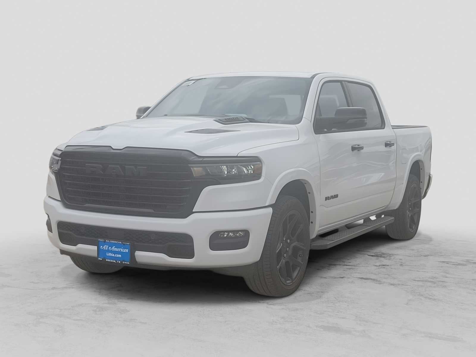 2026 RAM 1500 RAM 1500 LARAMIE CREW CAB 4X4 5'7' BOX in Bright White Clear-Coat Exterior Paint — front three-quarter view