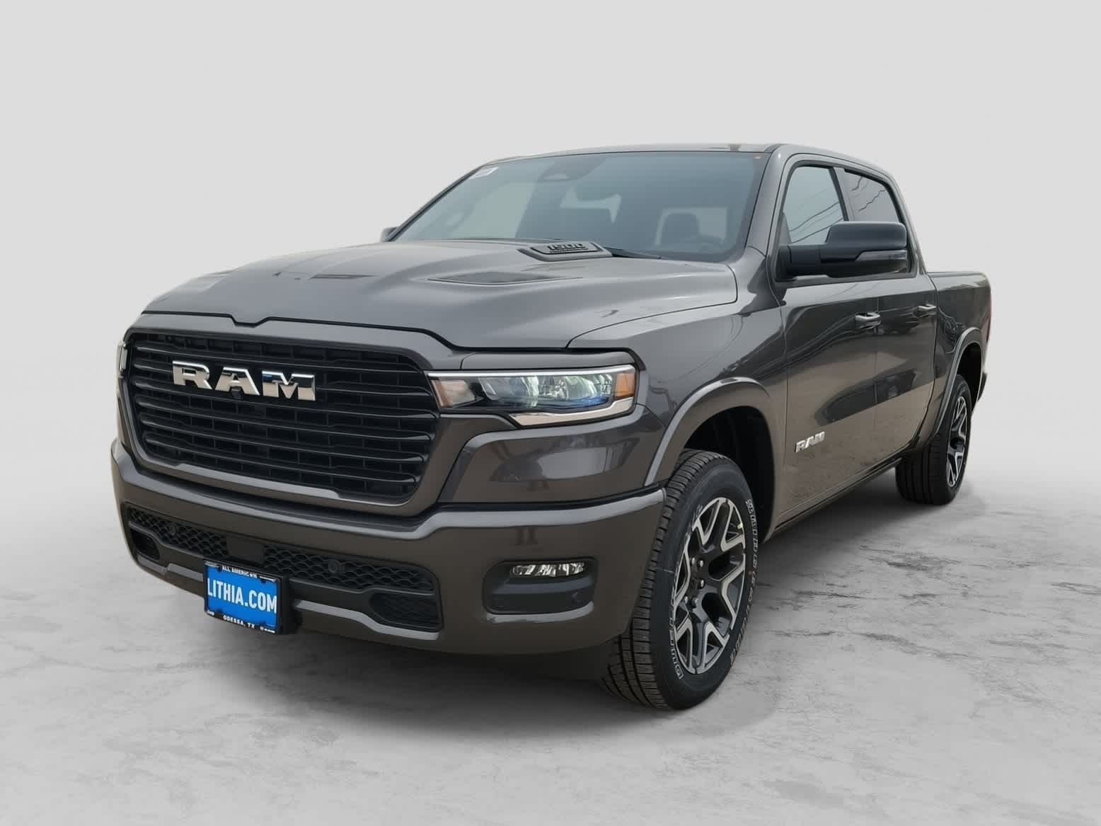 2026 RAM 1500 RAM 1500 LARAMIE CREW CAB 4X4 5'7' BOX in Granite Crystal Metallic Clear-Coat Exterior Paint — front three-quarter view
