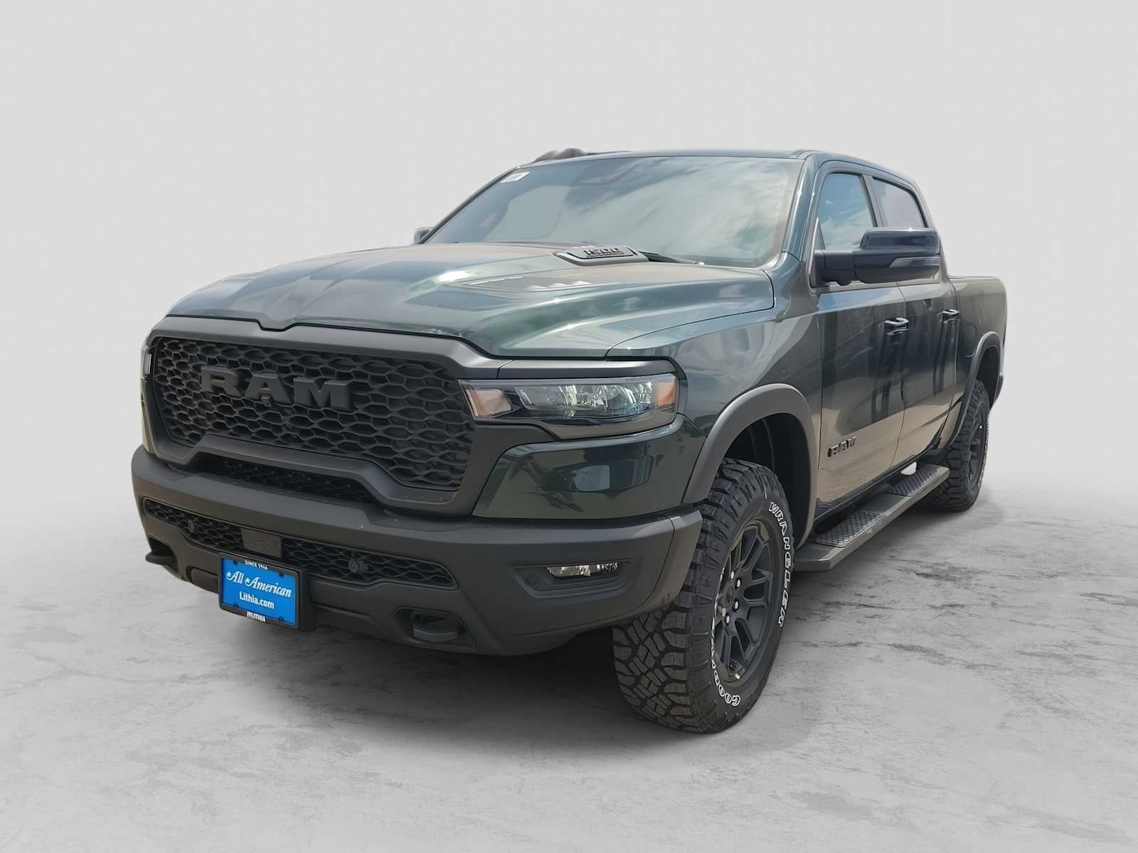 2026 RAM 1500 RAM 1500 REBEL CREW CAB 4X4 5'7' BOX in Serrano-Green Metallic Exterior Paint — front three-quarter view