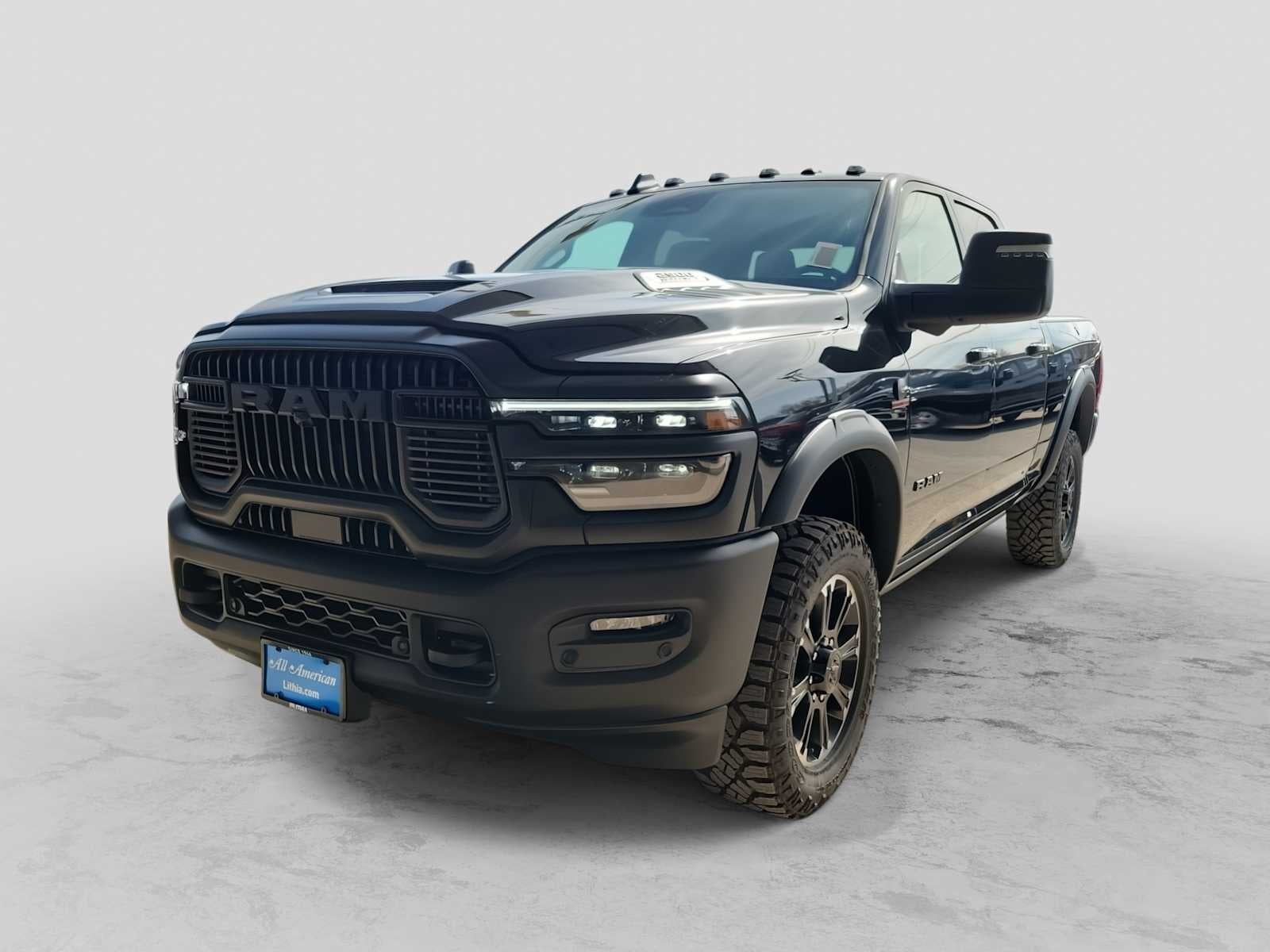 2026 RAM 2500 RAM 2500 REBEL CREW CAB 4X4 6'4' BOX in Diamond Black Crystal Pearl-Coat Exterior Paint — front three-quarter view