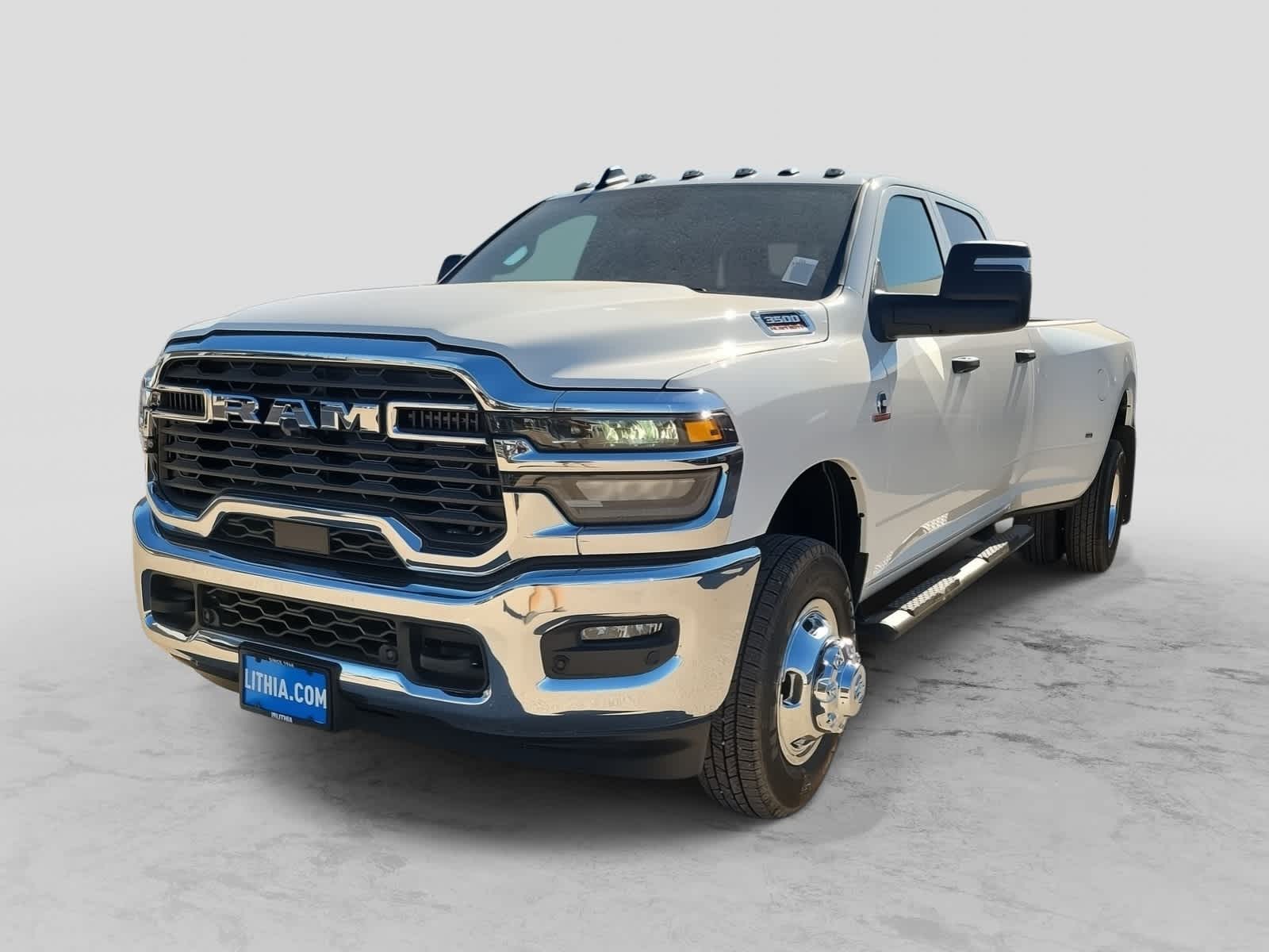 2026 RAM 3500 RAM 3500 TRADESMAN CREW CAB 4X4 8' BOX in Bright White Clear-Coat Exterior Paint — front three-quarter view
