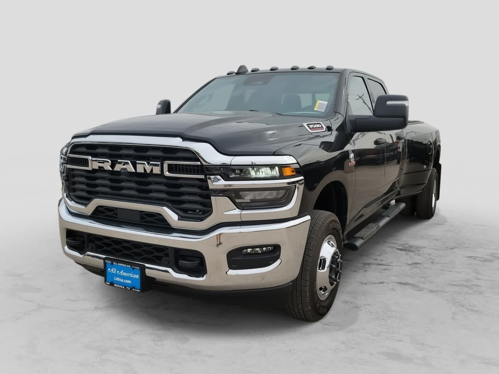 2026 RAM 3500 RAM 3500 TRADESMAN CREW CAB 4X4 8' BOX in Diamond Black Crystal Pearl-Coat Exterior Paint — front three-quarter view