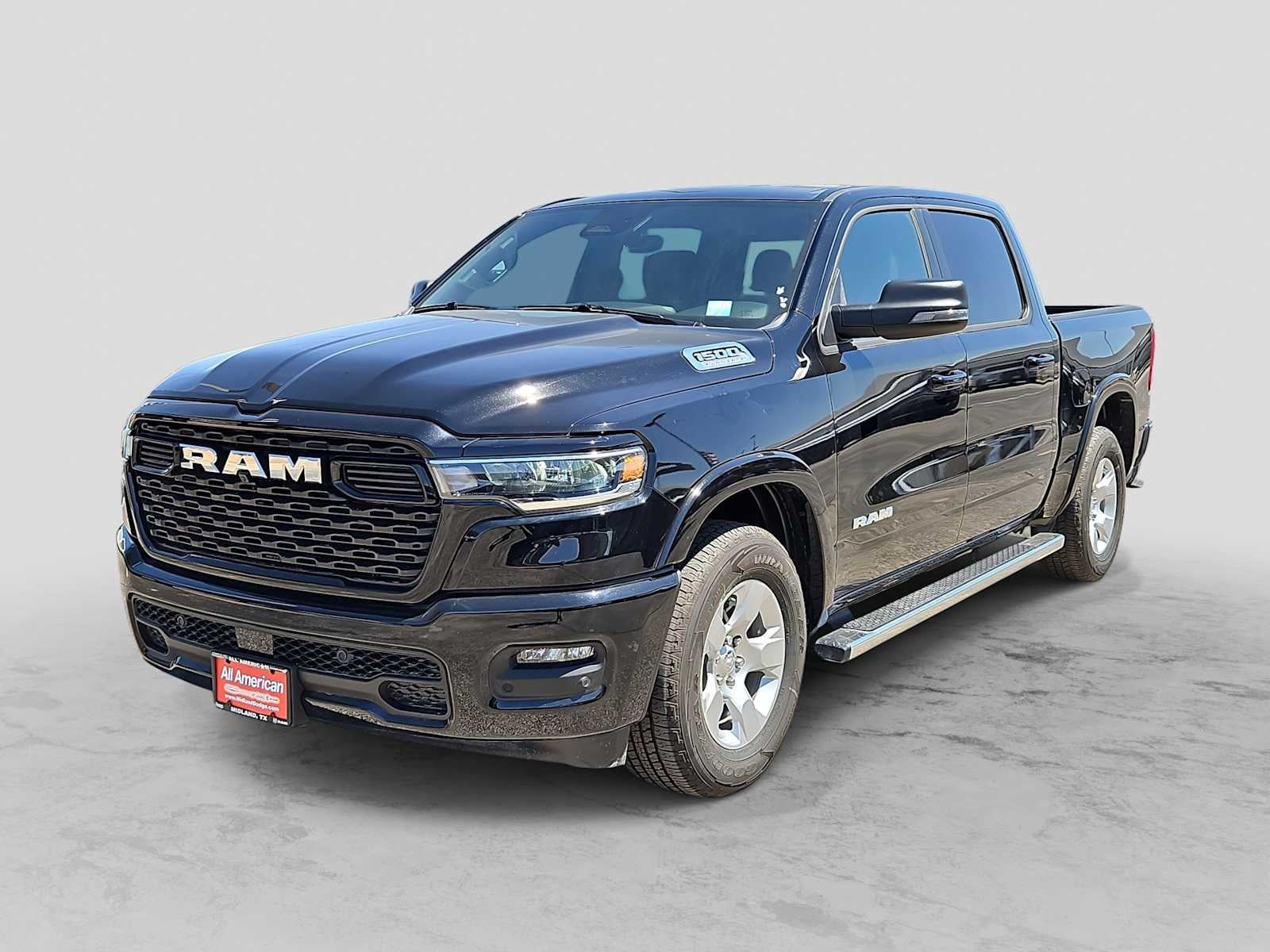 2026 RAM 1500 RAM 1500 LONE STAR CREW CAB 4X4 5'7' BOX in Diamond Black Crystal Pearl-Coat Exterior Paint — front three-quarter view