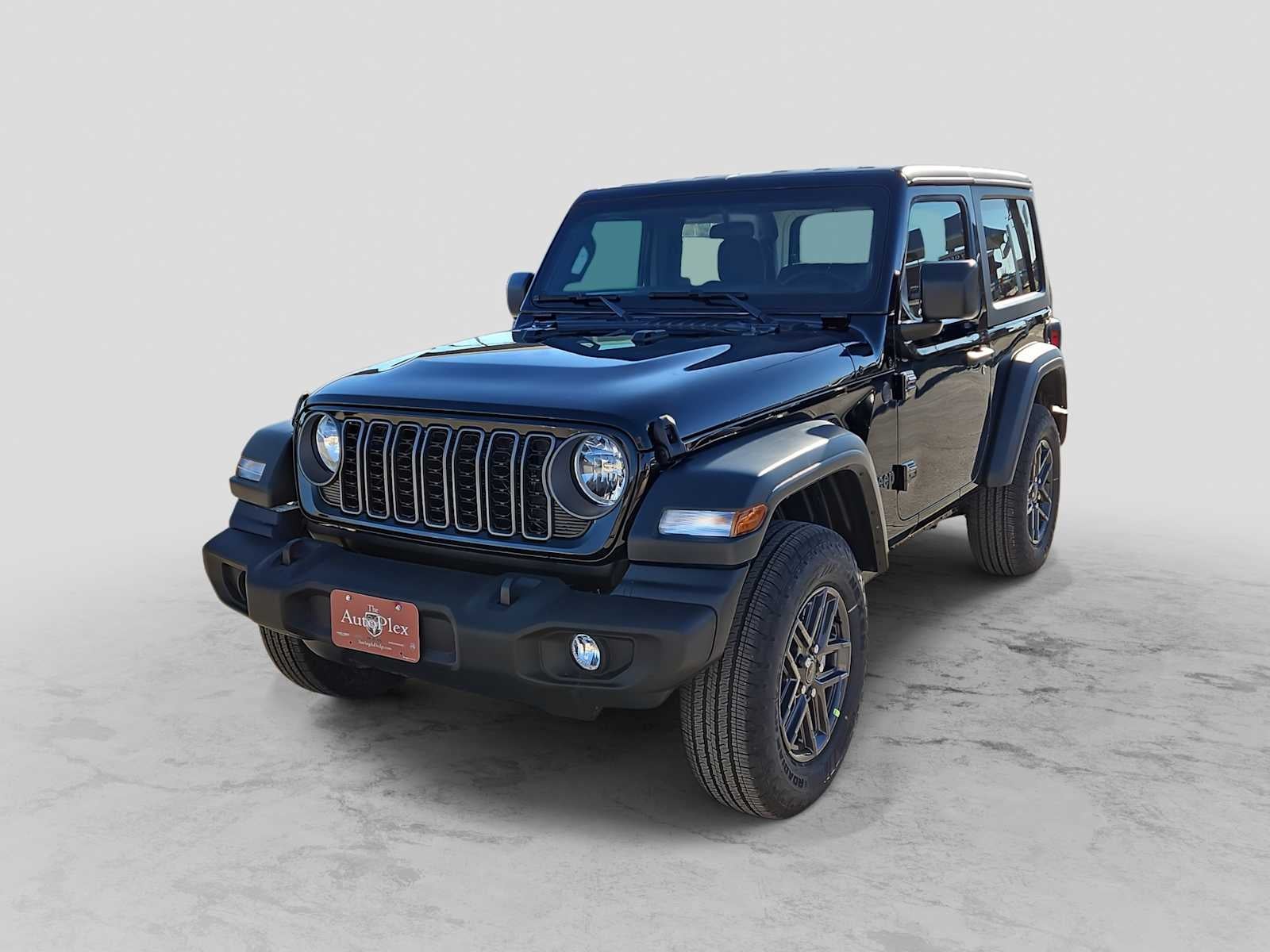 2026 Jeep Wrangler WRANGLER 2-DOOR SPORT in Black Clear-Coat Exterior Paint — front three-quarter view