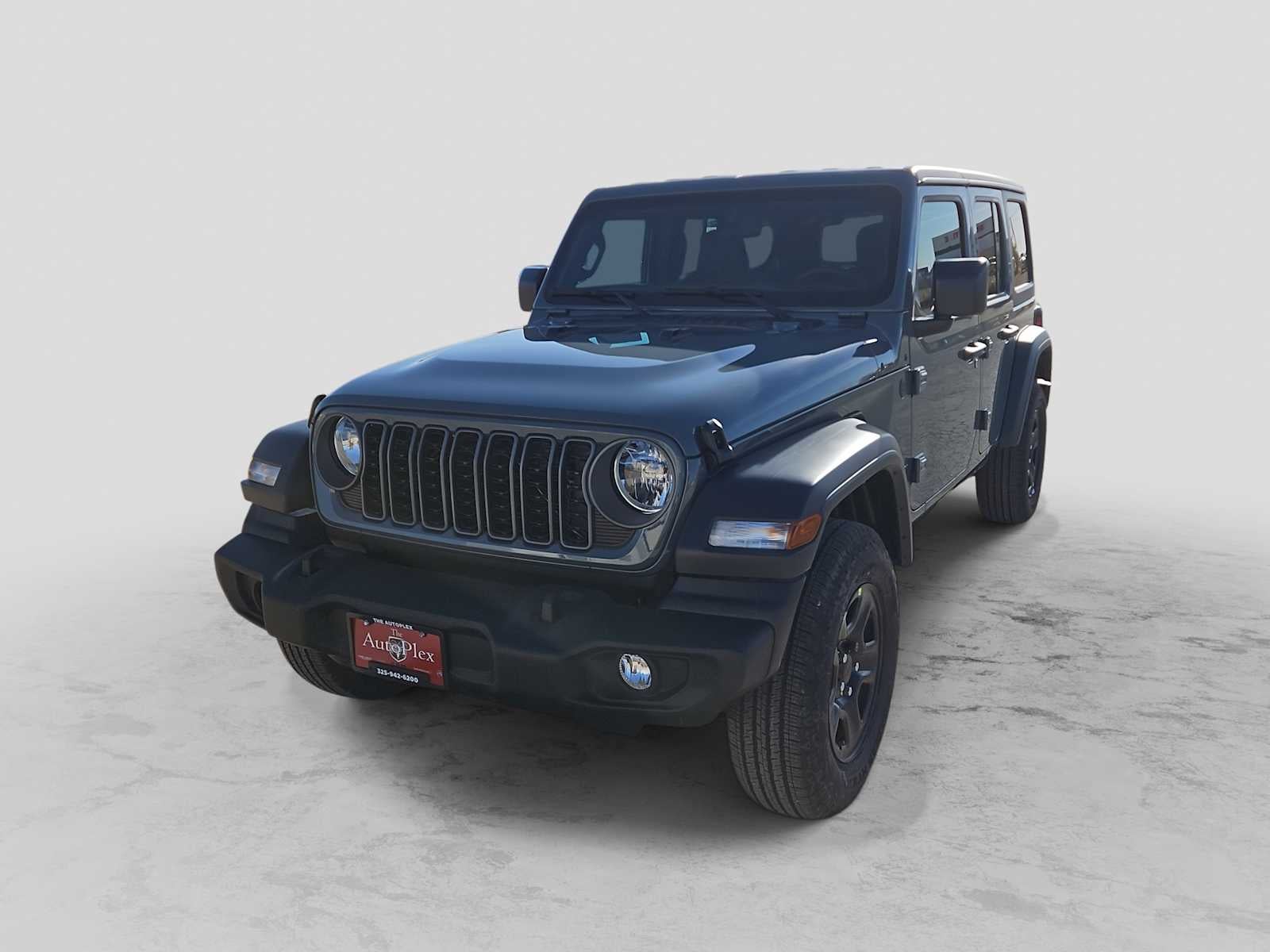 2026 Jeep Wrangler WRANGLER 4-DOOR SPORT in Anvil Clear-Coat Exterior Paint — front three-quarter view
