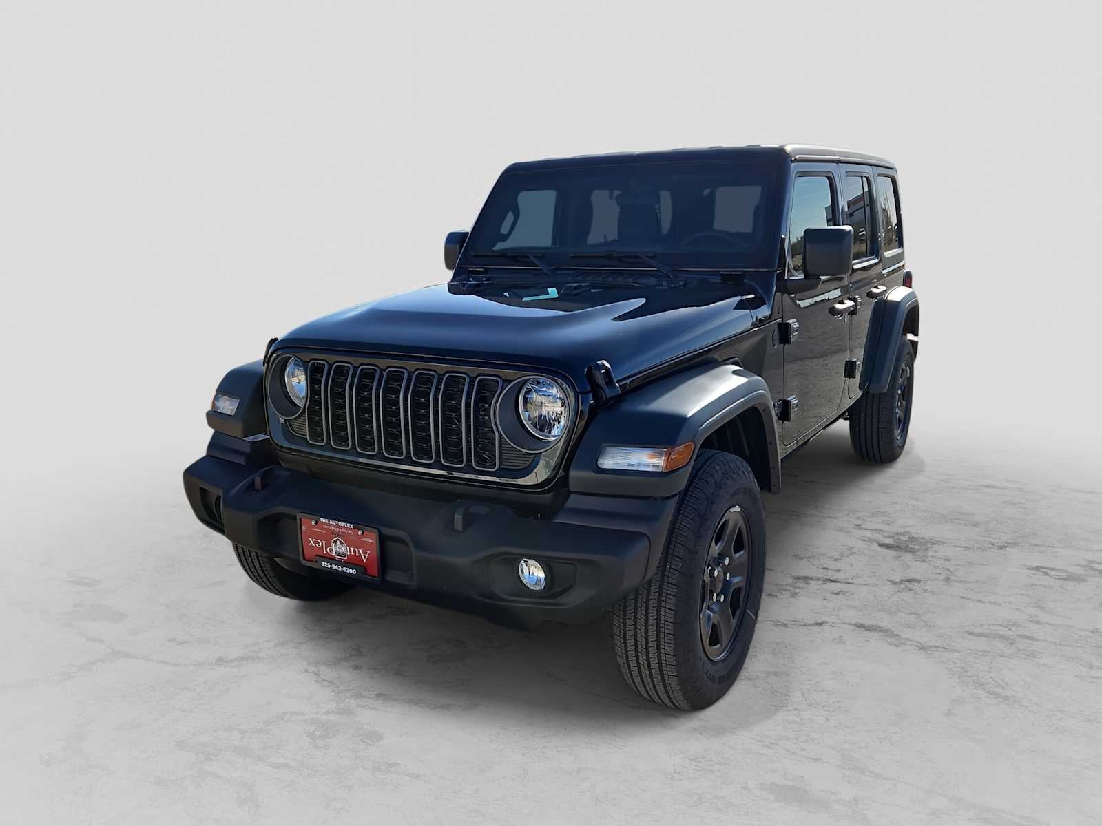 2026 Jeep Wrangler WRANGLER 4-DOOR SPORT in Black Clear-Coat Exterior Paint — front three-quarter view