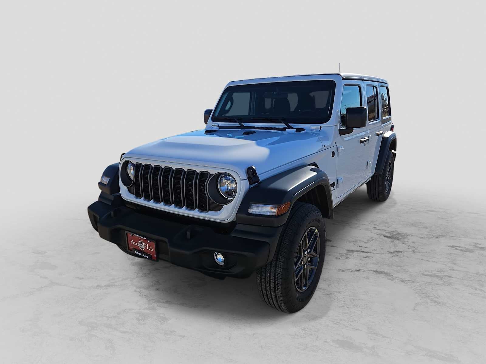 2026 Jeep Wrangler WRANGLER 4-DOOR SPORT in Bright White Clear-Coat Exterior Paint — front three-quarter view