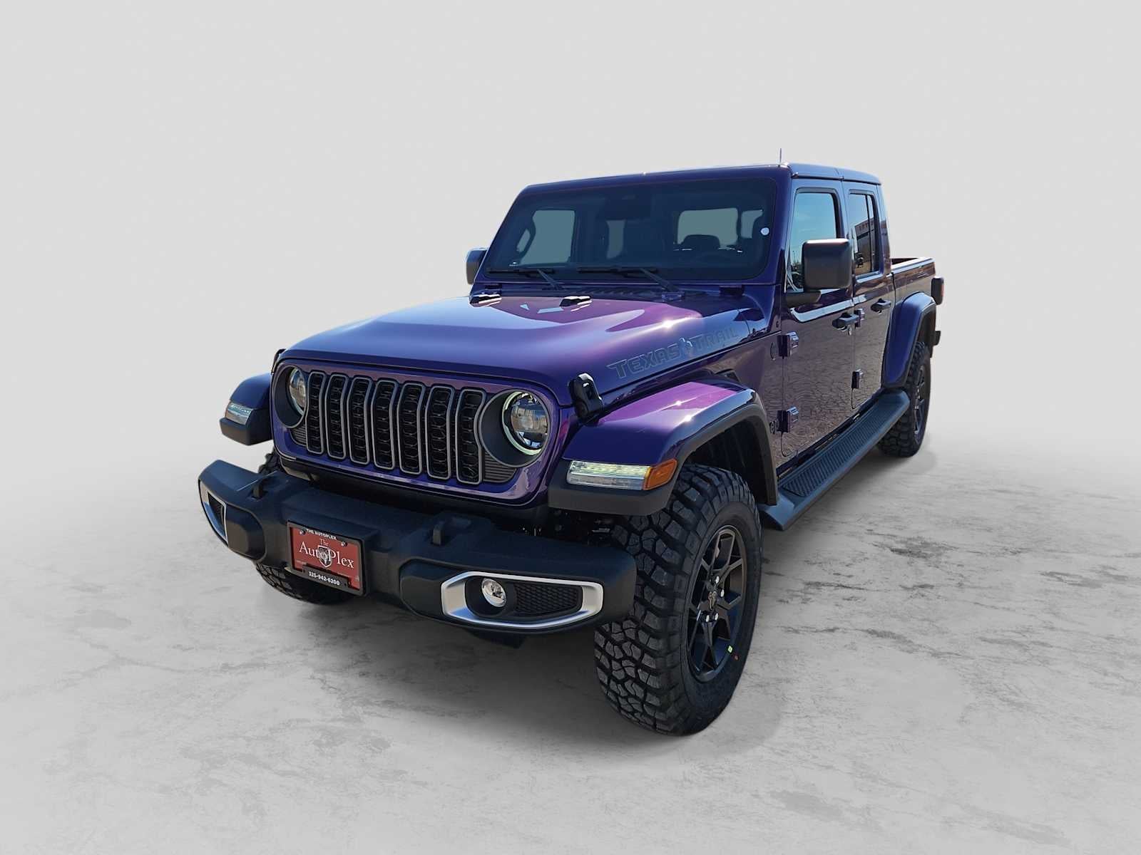 2026 Jeep Gladiator GLADIATOR TEXAS TRAIL 4X4 in Reign Exterior Paint — front three-quarter view