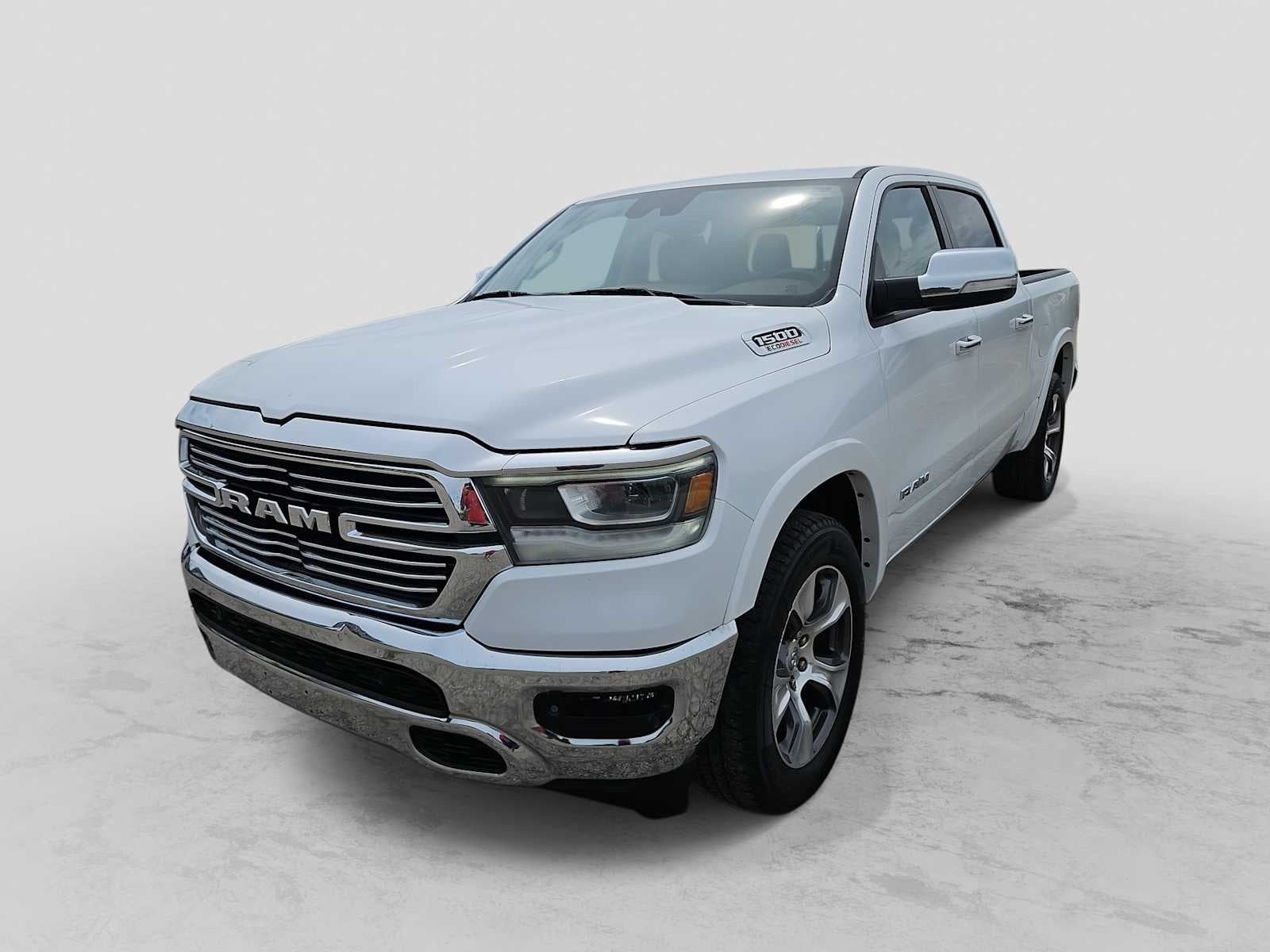 2022 RAM 1500 Laramie Crew Cab 4x2 5'7' Box in Bright White Clearcoat — front three-quarter view