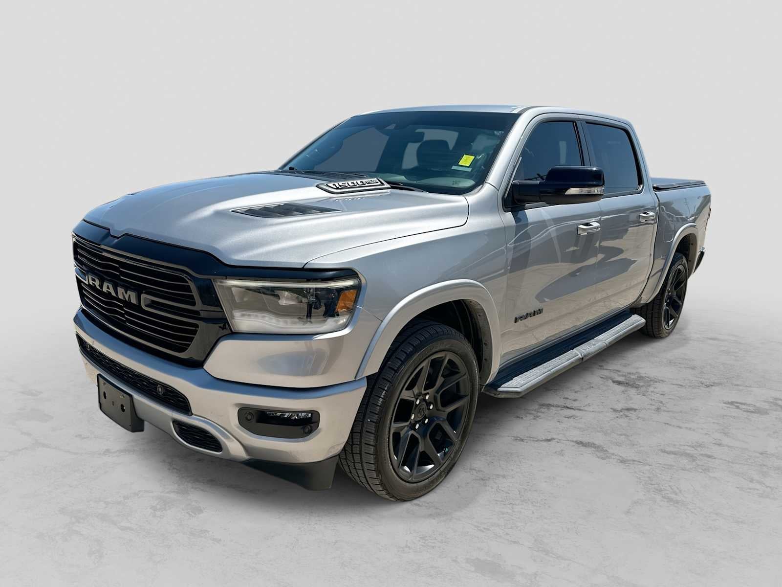 2021 RAM 1500 Laramie 4x2 Crew Cab 57 Box in Billet Silver Metallic Clear Coat — front three-quarter view