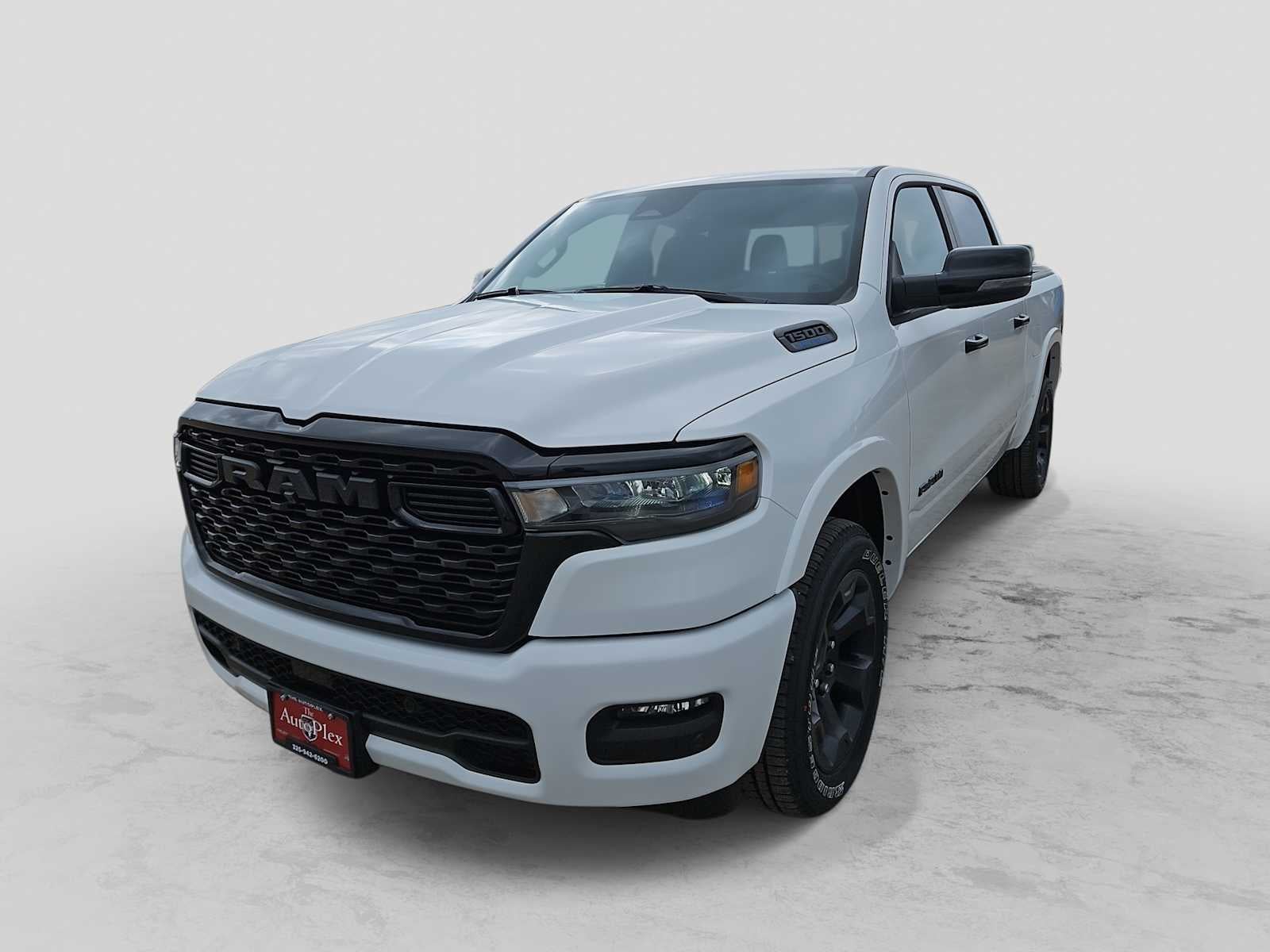 2026 RAM 1500 RAM 1500 LONE STAR CREW CAB 4X4 5'7' BOX in Bright White Clear-Coat Exterior Paint — front three-quarter view