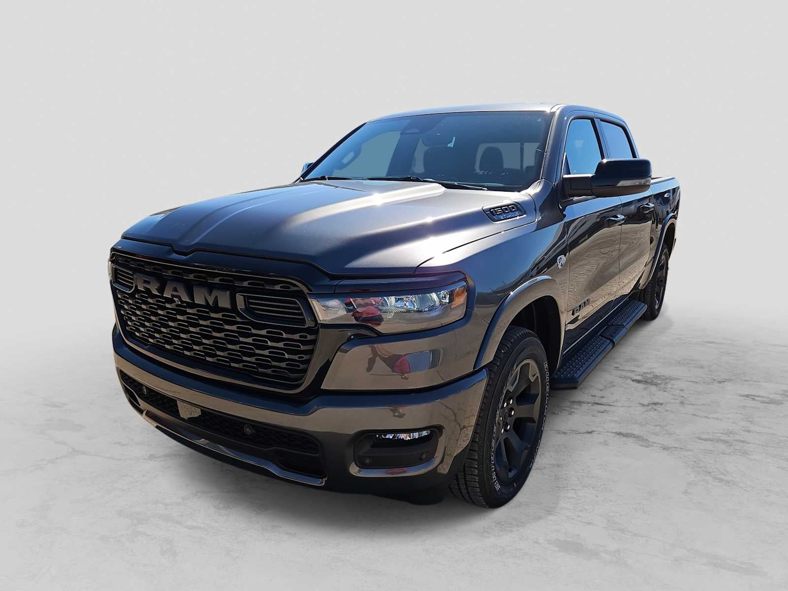 2026 RAM 1500 RAM 1500 BIG HORN CREW CAB 4X4 5'7' BOX in Granite Crystal Metallic Clear-Coat Exterior Paint — front three-quarter view