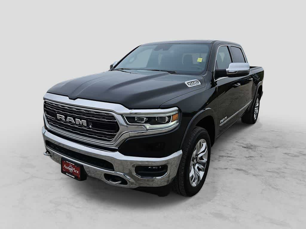 2024 RAM 1500 Limited Crew Cab 4x4 5'7' Box in Diamond Black Crystal Pearlcoat — front three-quarter view