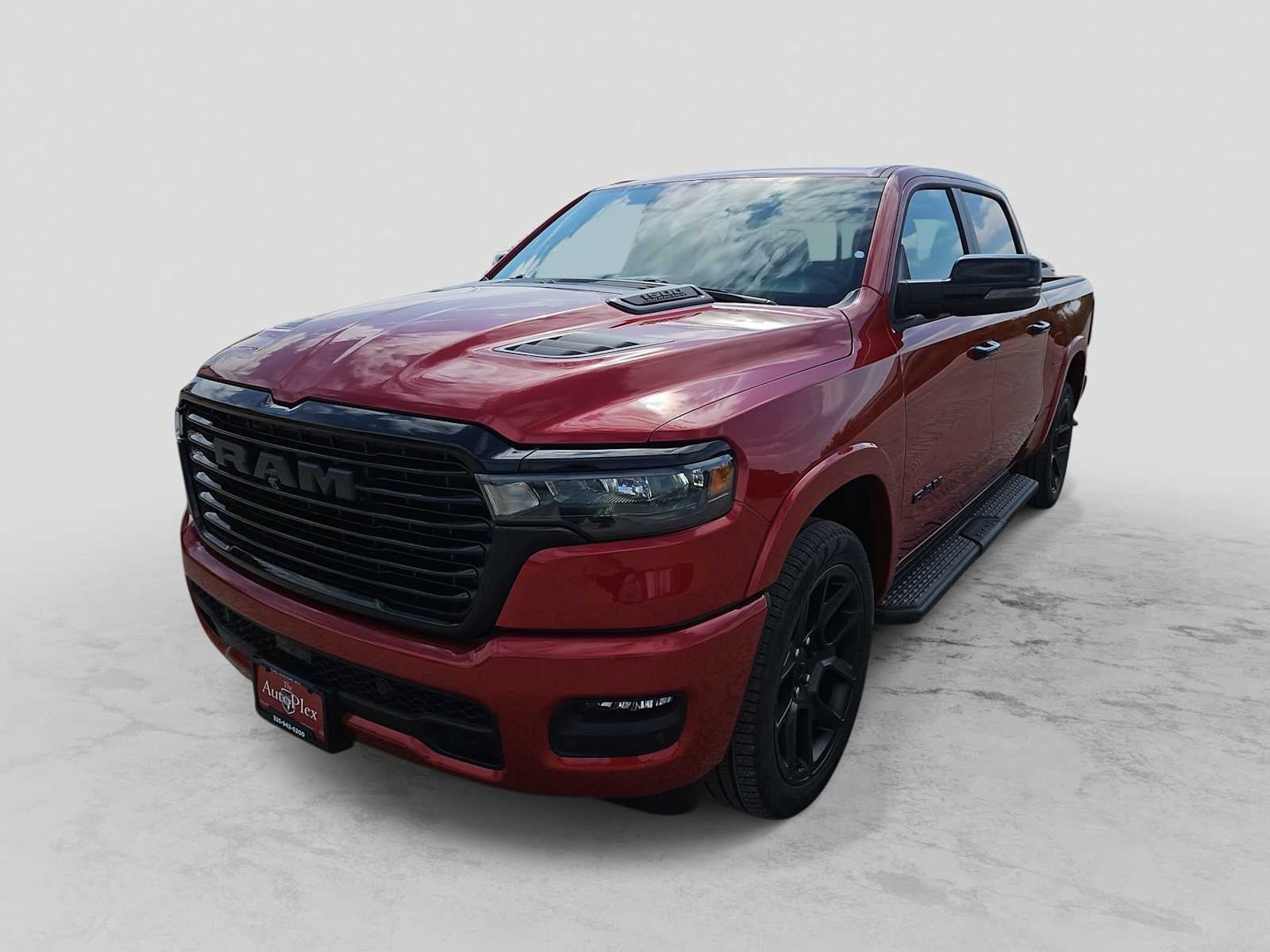 2026 RAM 1500 RAM 1500 LARAMIE CREW CAB 4X4 5'7' BOX in Molten Red Pearl-Coat Exterior Paint — front three-quarter view