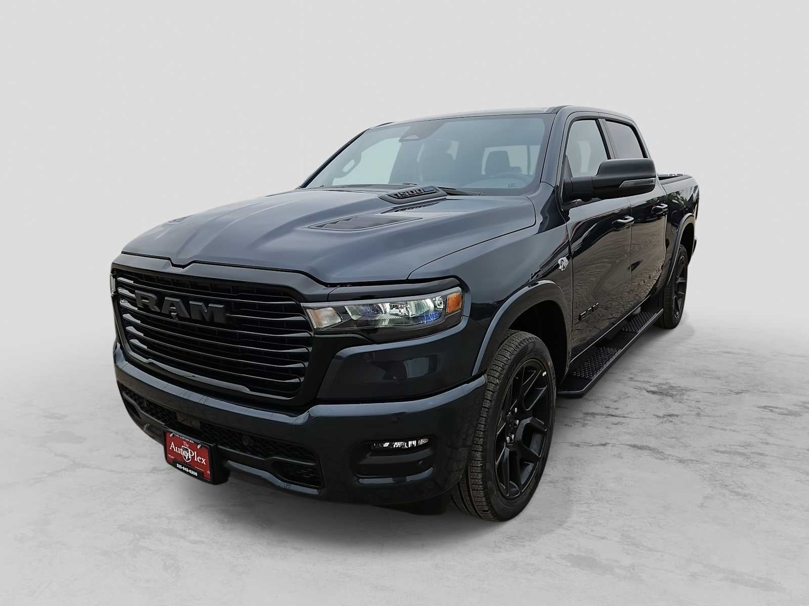 2026 RAM 1500 RAM 1500 LARAMIE CREW CAB 4X4 5'7' BOX in Forged Blue Metallic Exterior Paint — front three-quarter view