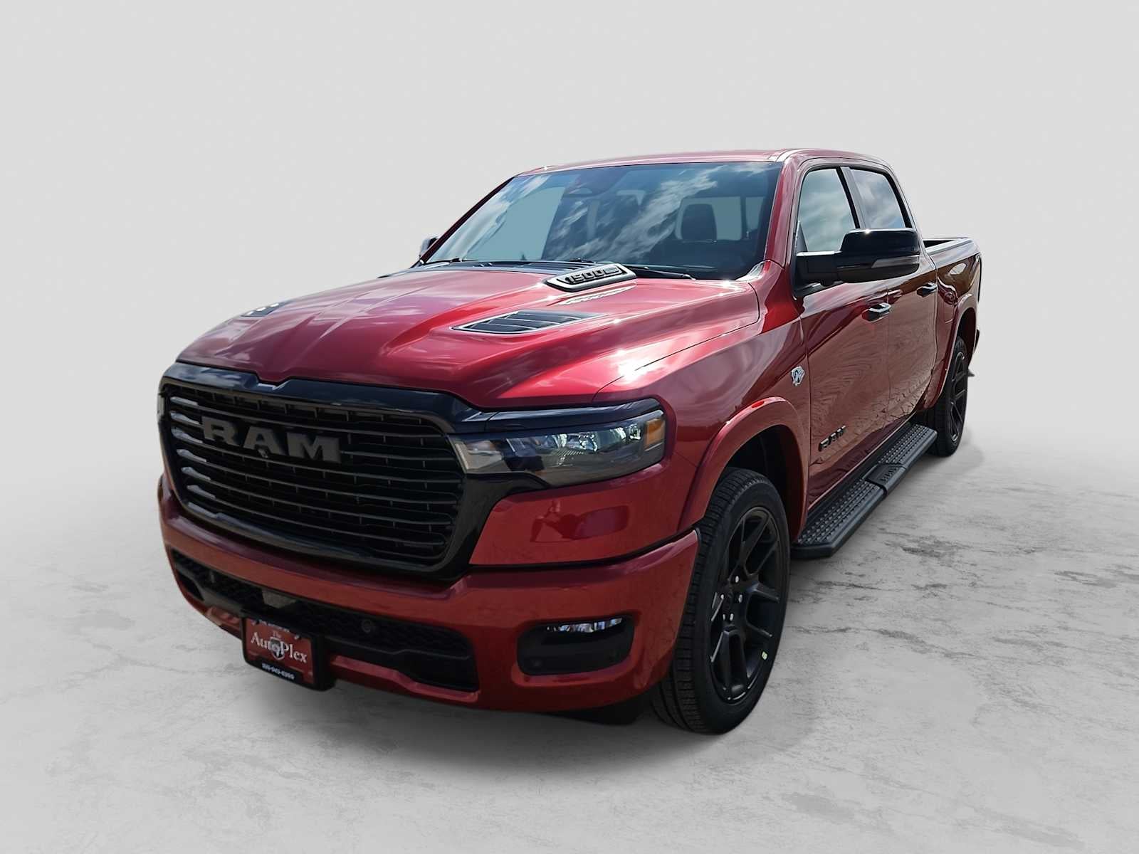 2026 RAM 1500 RAM 1500 LARAMIE CREW CAB 4X4 5'7' BOX in Molten Red Pearl-Coat Exterior Paint — front three-quarter view