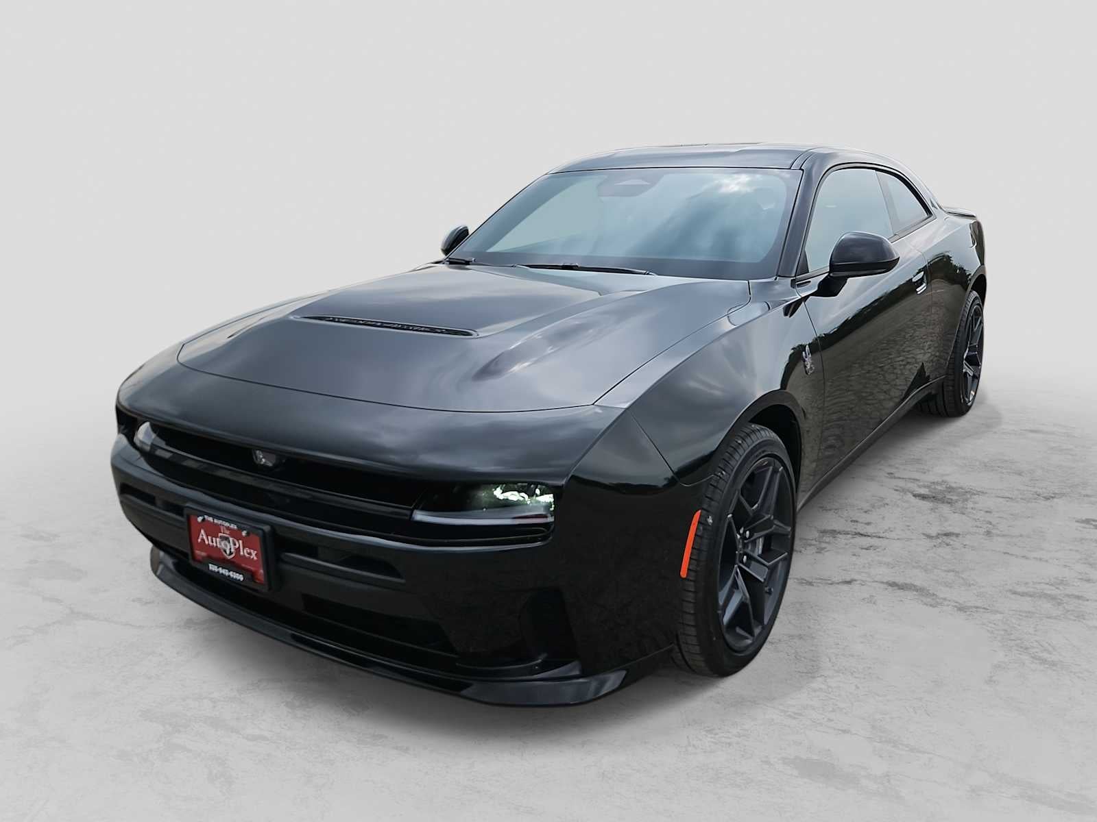 2026 Dodge Charger CHARGER SCAT PACK 2-DOOR AWD in Diamond Black Crystal Pearlcoat — front three-quarter view