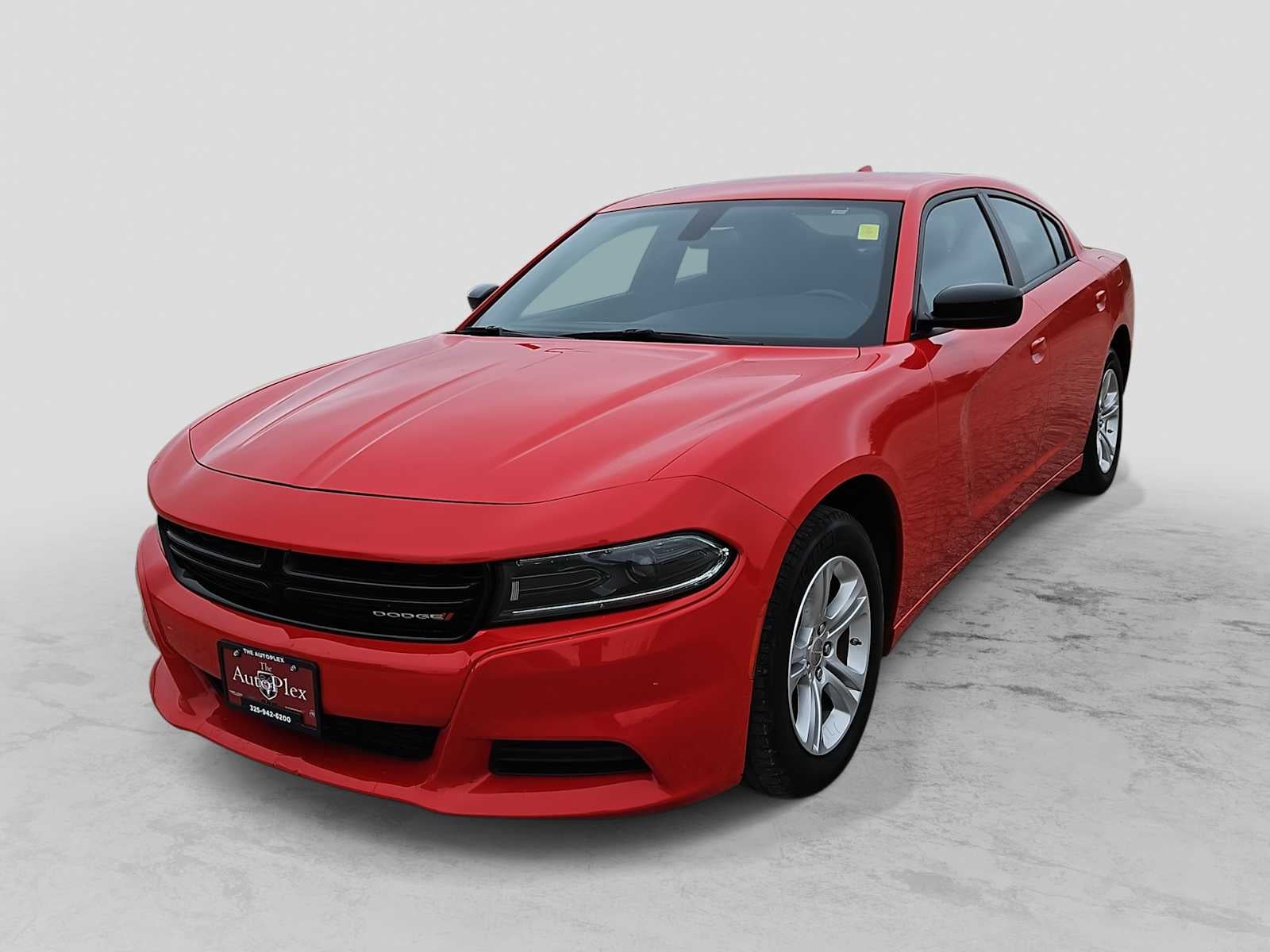 2023 Dodge Charger SXT in Torred Clearcoat — front three-quarter view
