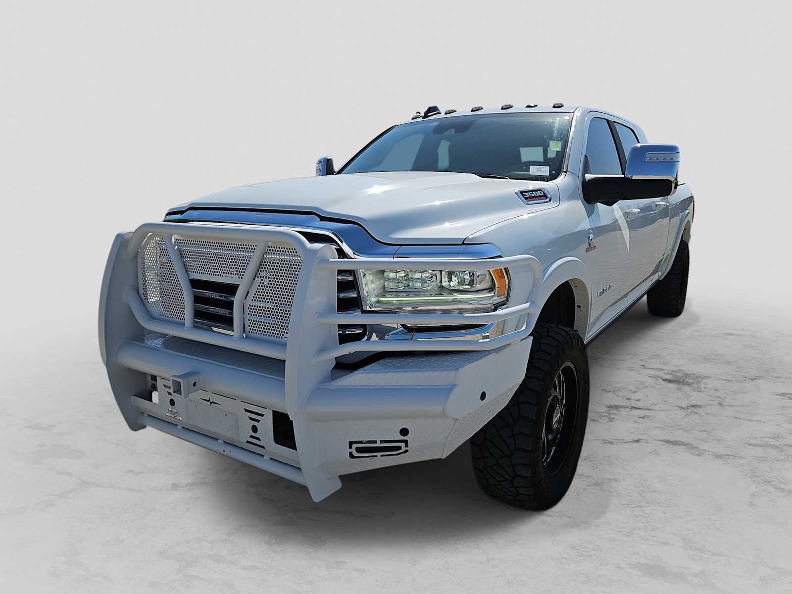 2024 RAM 3500 Limited Longhorn Mega Cab 4x4 6'4' Box in Bright White Clearcoat — front three-quarter view