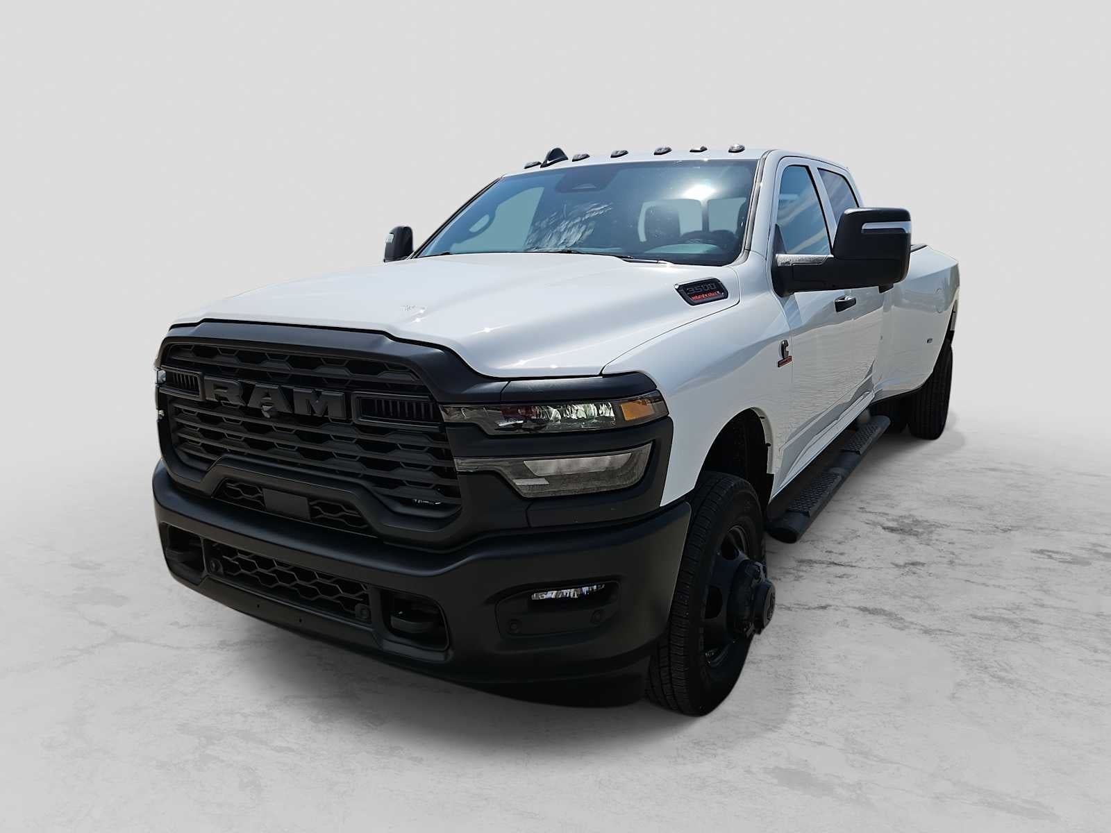 2026 RAM 3500 RAM 3500 TRADESMAN CREW CAB 4X4 8' BOX in Bright White Clear-Coat Exterior Paint — front three-quarter view