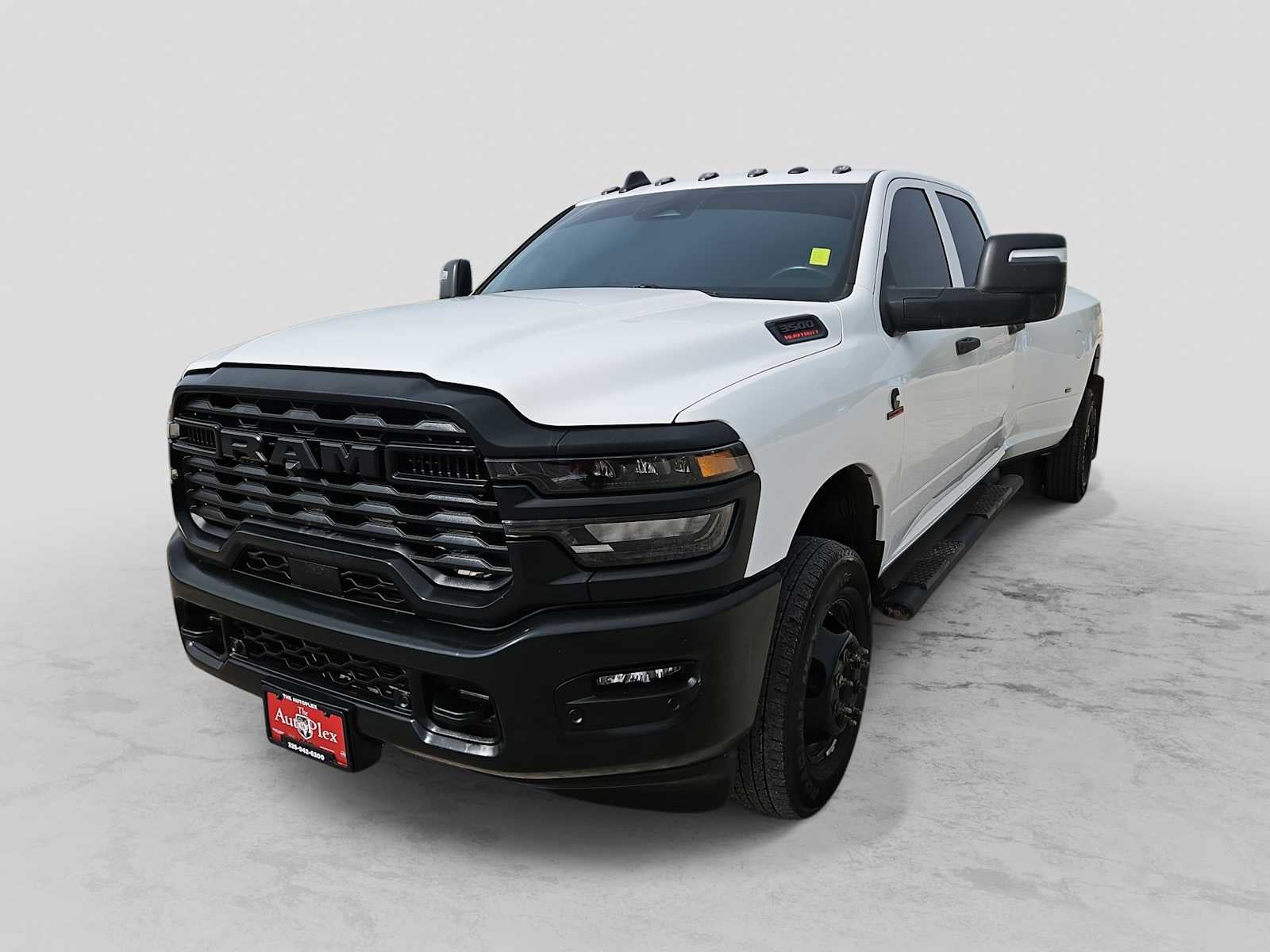 2026 RAM 3500 Tradesman Crew Cab 4x4 8' Box in Bright White Clearcoat — front three-quarter view