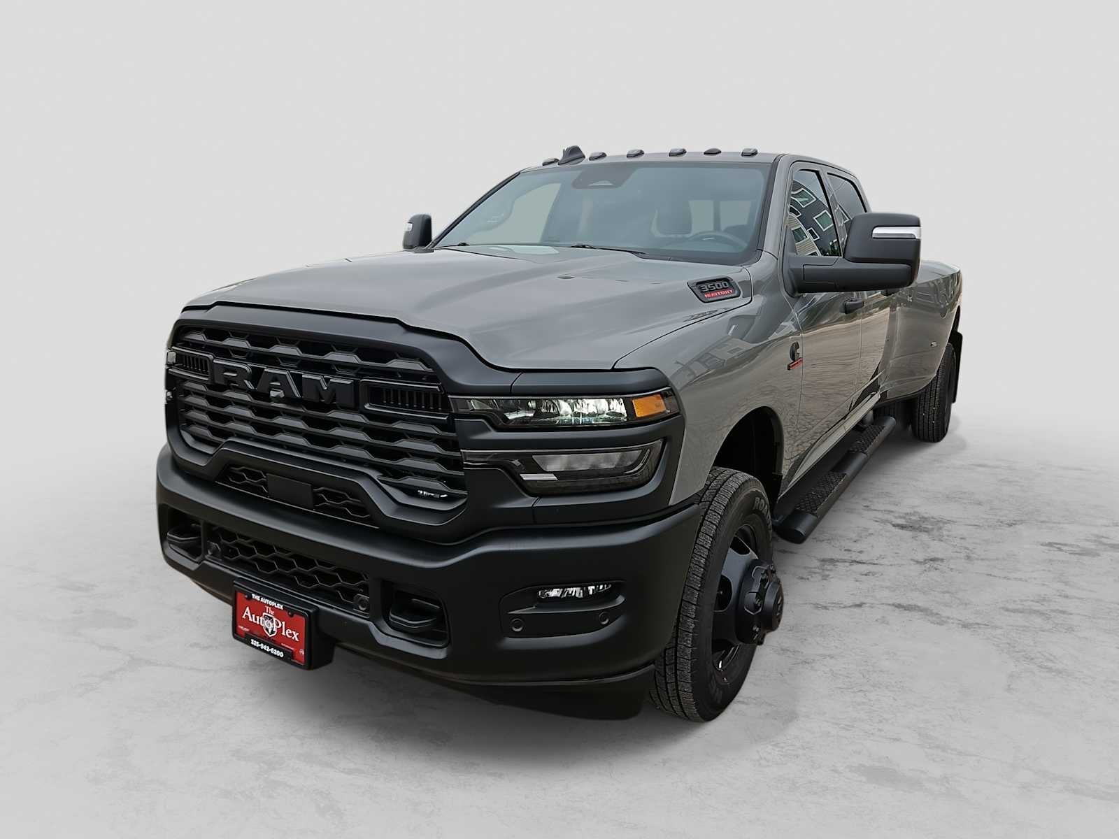 2026 RAM 3500 RAM 3500 TRADESMAN CREW CAB 4X4 8' BOX in Ceramic Gray Clear-Coat Exterior Paint — front three-quarter view