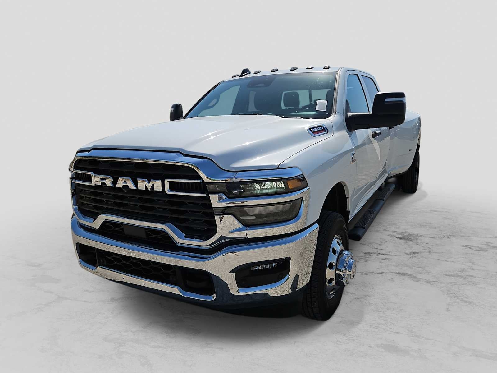 2026 RAM 3500 RAM 3500 TRADESMAN CREW CAB 4X4 8' BOX in Bright White Clear-Coat Exterior Paint — front three-quarter view