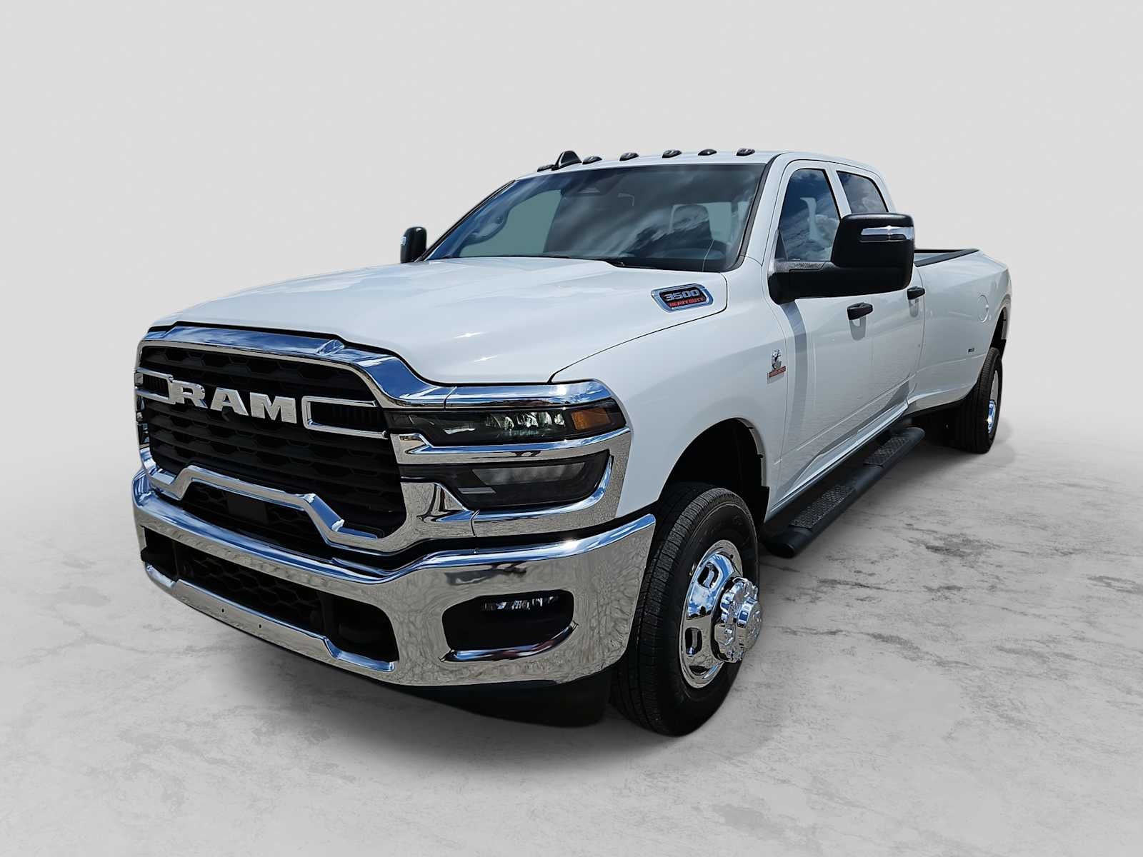 2026 RAM 3500 RAM 3500 TRADESMAN CREW CAB 4X4 8' BOX in Bright White Clear-Coat Exterior Paint — front three-quarter view