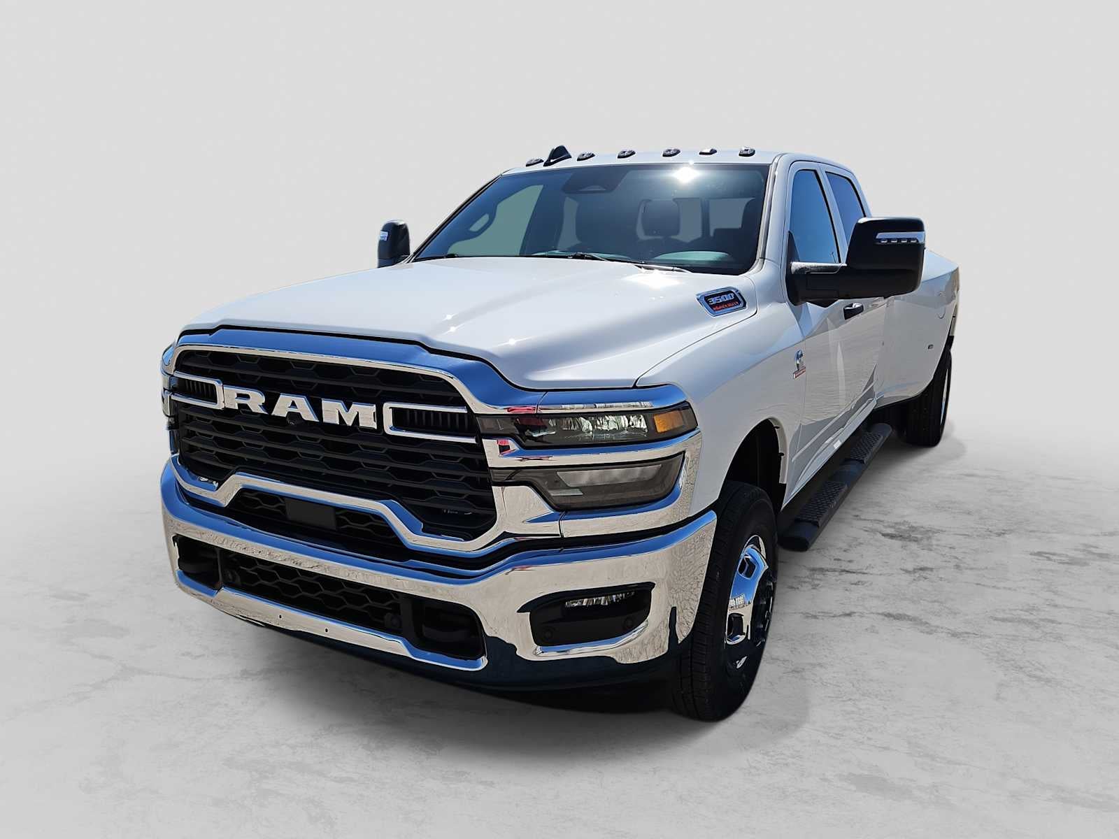 2026 RAM 3500 RAM 3500 TRADESMAN CREW CAB 4X4 8' BOX in Bright White Clear-Coat Exterior Paint — front three-quarter view