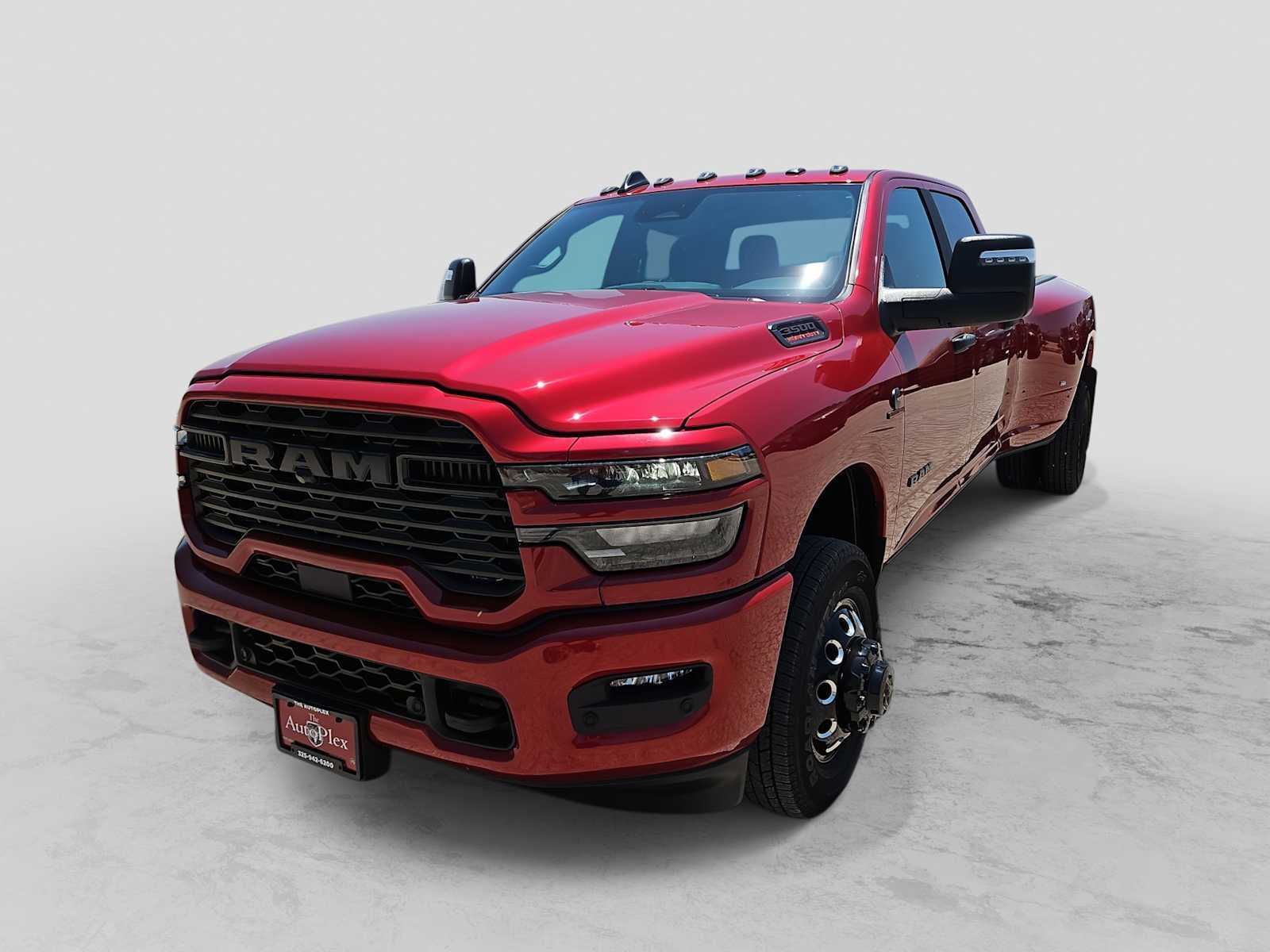 2026 RAM 3500 RAM 3500 LONE STAR CREW CAB 4X4 8' BOX in Molten Red Pearl-Coat Exterior Paint — front three-quarter view