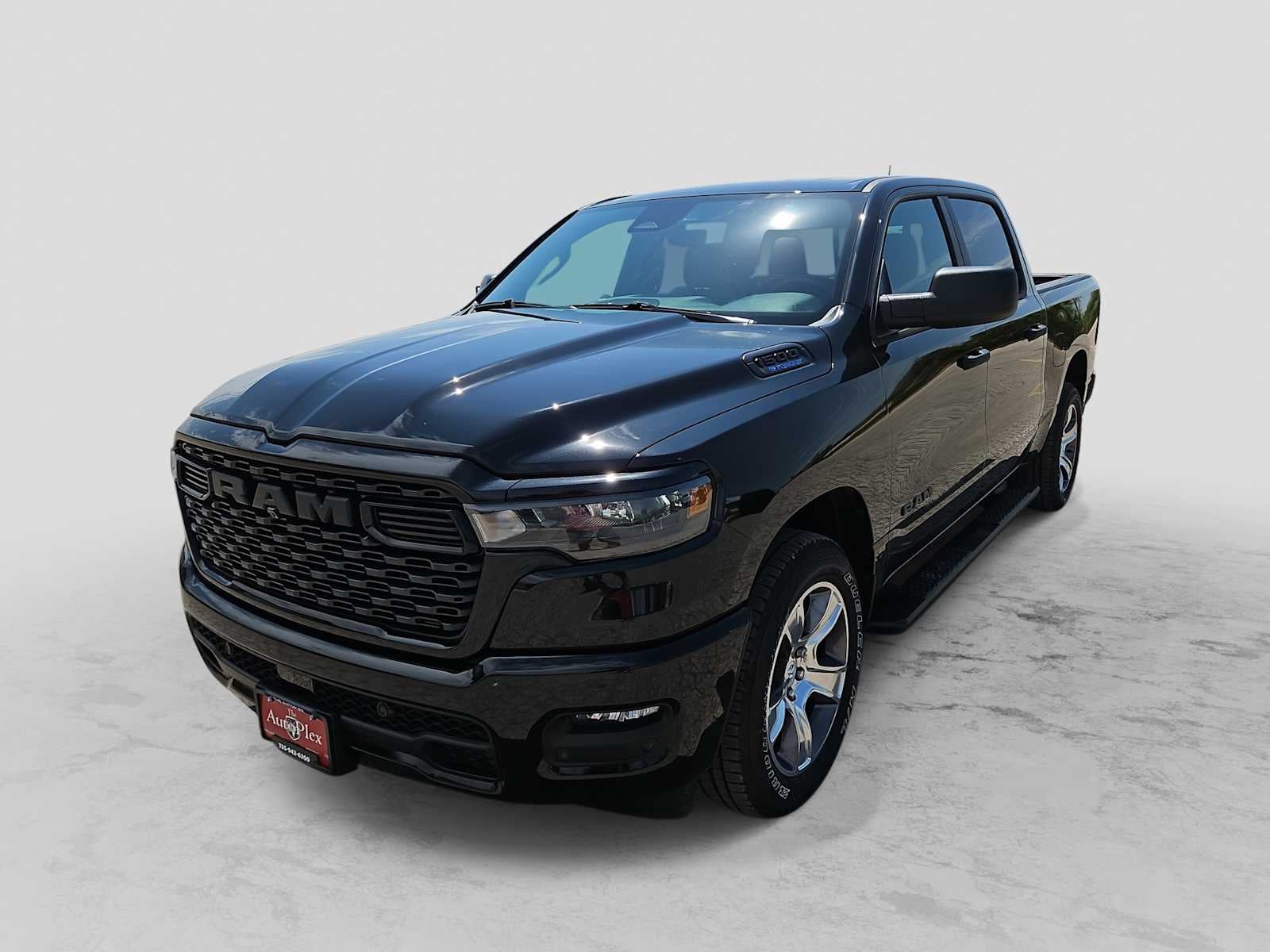 2026 RAM 1500 RAM 1500 EXPRESS CREW CAB 4X2 5'7' BOX in Diamond Black Crystal Pearl-Coat Exterior Paint — front three-quarter view