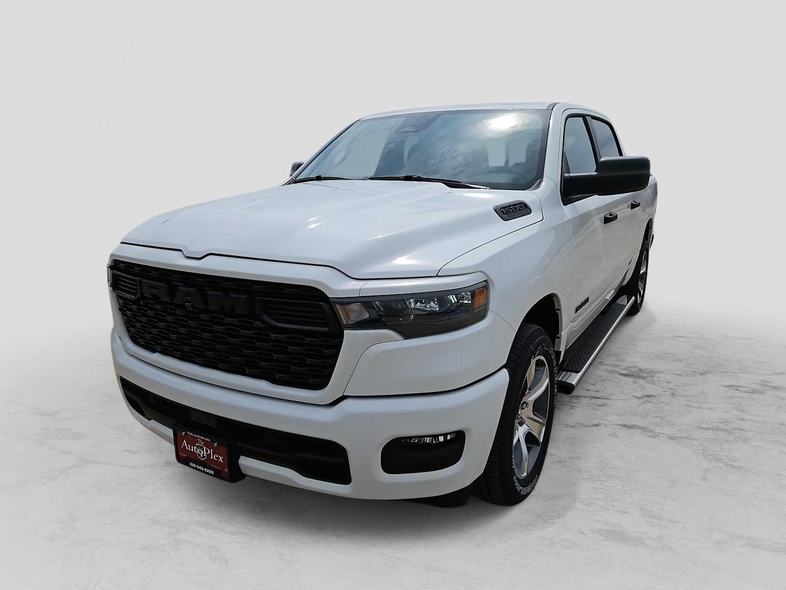 2026 RAM 1500 RAM 1500 EXPRESS CREW CAB 4X2 5'7' BOX in Bright White Clear-Coat Exterior Paint — front three-quarter view