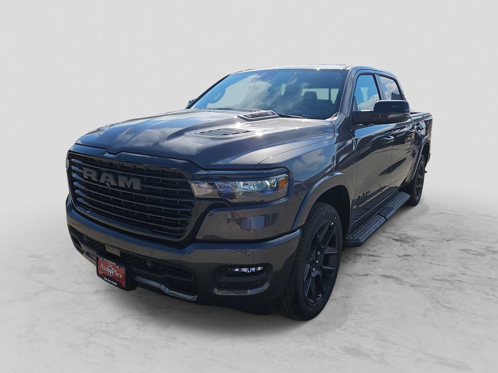 2026 RAM 1500 RAM 1500 LARAMIE CREW CAB 4X4 5'7' BOX in Granite Crystal Metallic Clear-Coat Exterior Paint — front three-quarter view