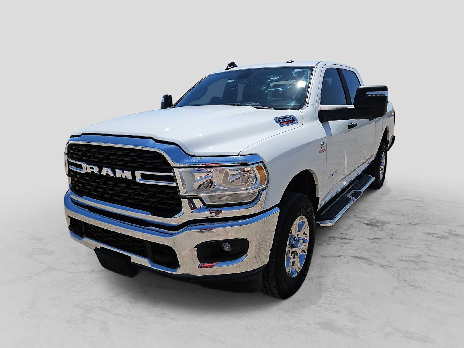 2024 RAM 2500 Big Horn Crew Cab 4x4 6'4' Box in Bright White Clearcoat — front three-quarter view