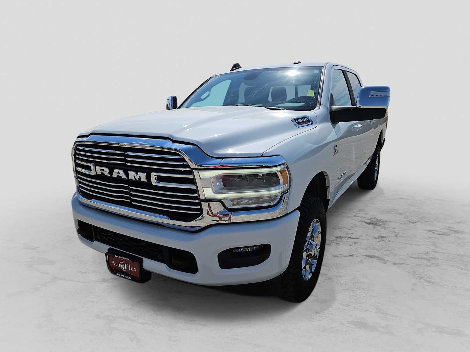 2024 RAM 2500 Laramie Crew Cab 4x4 6'4' Box in Bright White Clearcoat — front three-quarter view