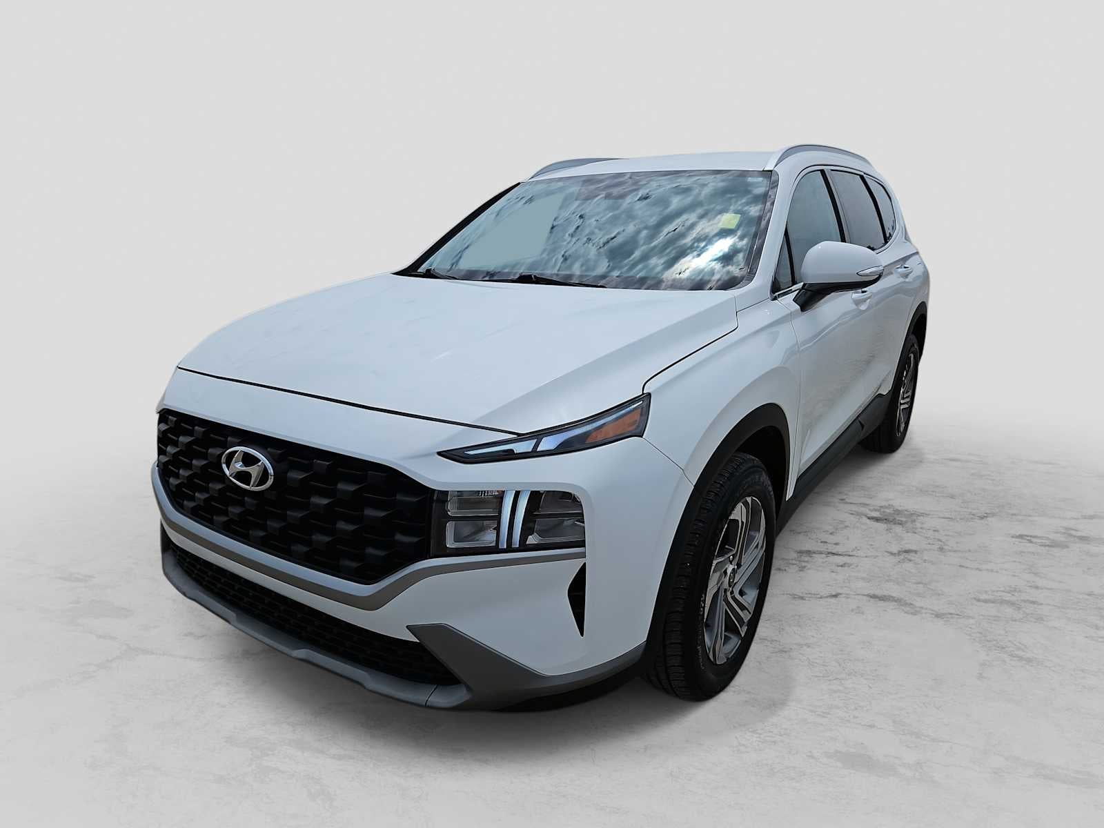 2023 Hyundai Santa Fe SEL in Quartz White — front three-quarter view